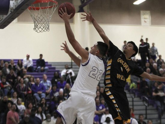 Javier Mariscol-Espinoza goes for the basket against Golden West.